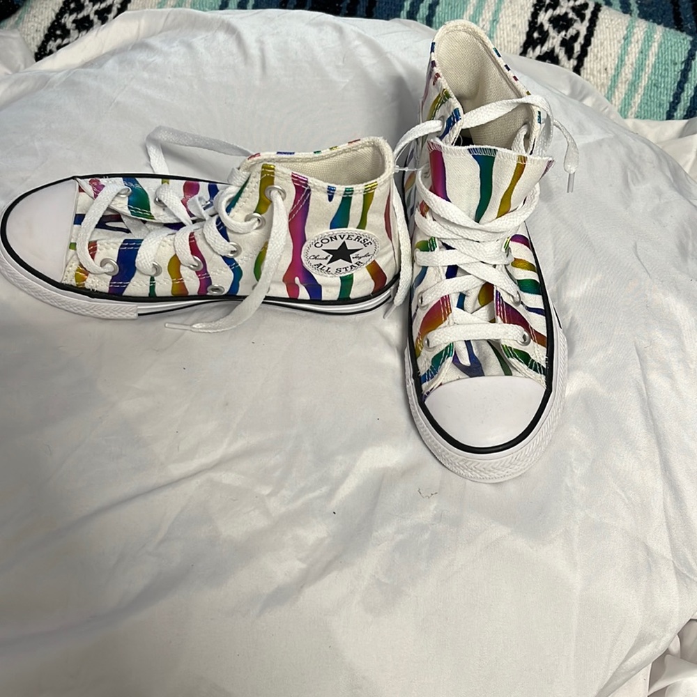 Kid’s size 13 Converse shoes with colorful zebra print. Never worn.NWOT